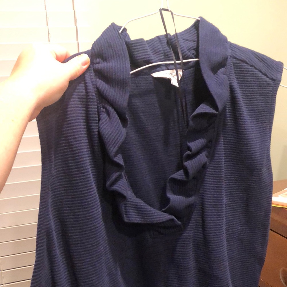 Navy ruffle neck top